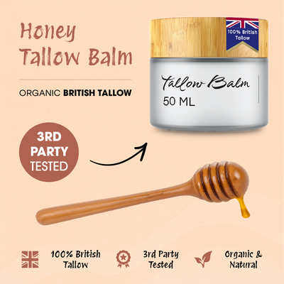 Honey Tallow Balm jar with a honey dipper on a beige background